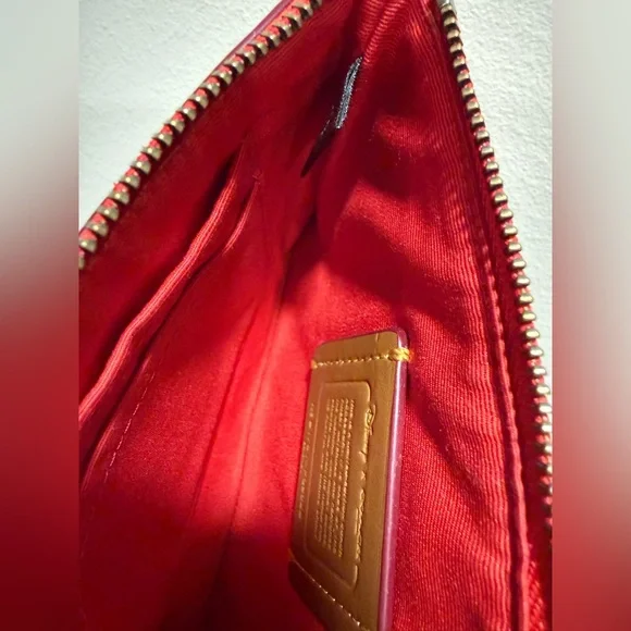 Coach x Disney Mickey on Bike Limited Edition Vibrant Red Leather Wristlet